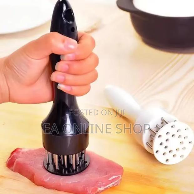 Meat Tenderizer. Ultra Sharp 16 Stainless Blades. · Photo 1