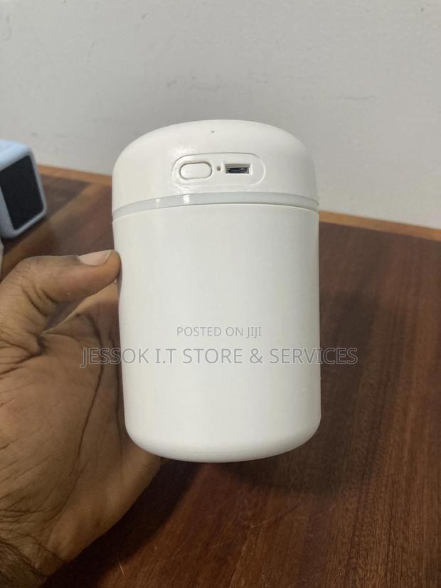 Portable Colorful Mini Air Humidifier Essential Oil Diffuser · Photo 1