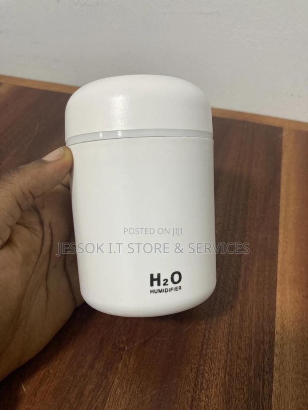 Portable Colorful Mini Air Humidifier Essential Oil Diffuser · Photo 5