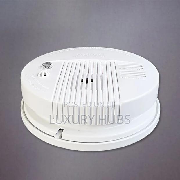 Security Alarm Smoke Detector · Photo 1