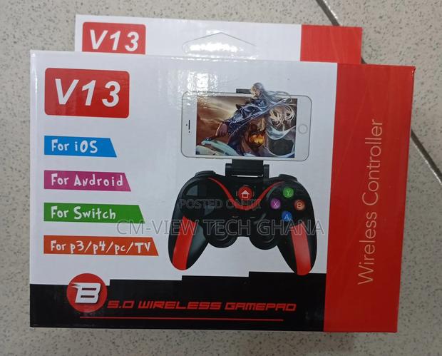 V13 Wireless Gamepad/ Controller ( With Phone Holder) · Photo 1