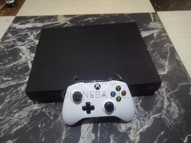 Xbox One X With 11 Games Installed · Photo 2