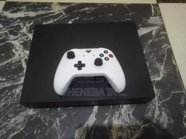 Xbox One X With 11 Games Installed · Photo 3