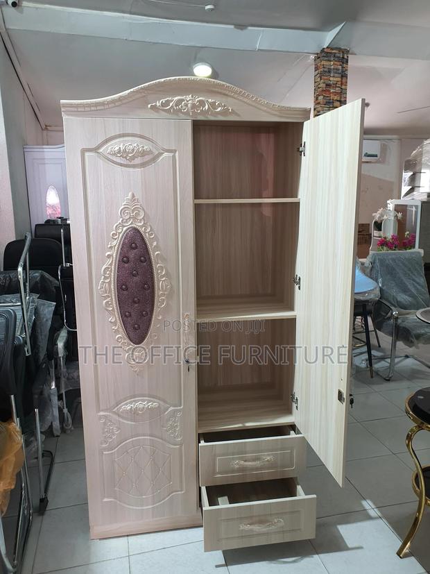 Light-Colored, Two-Door Wardrobe · Photo 2