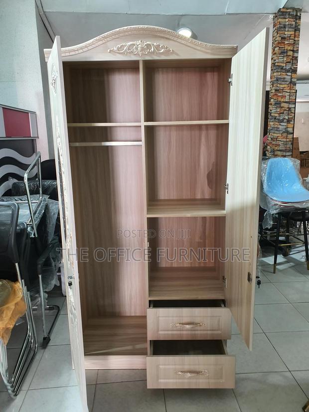 Light-Colored, Two-Door Wardrobe · Photo 3