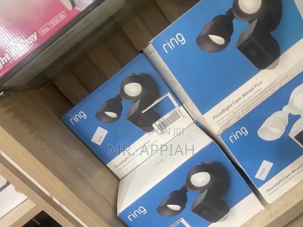 Shop Authentic Ring Floodlight Cam Wired Plus. · Photo 1