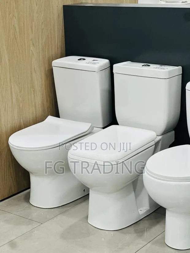 Water Closet - Close Coupled Toilet - Toilet Seat · Photo 1