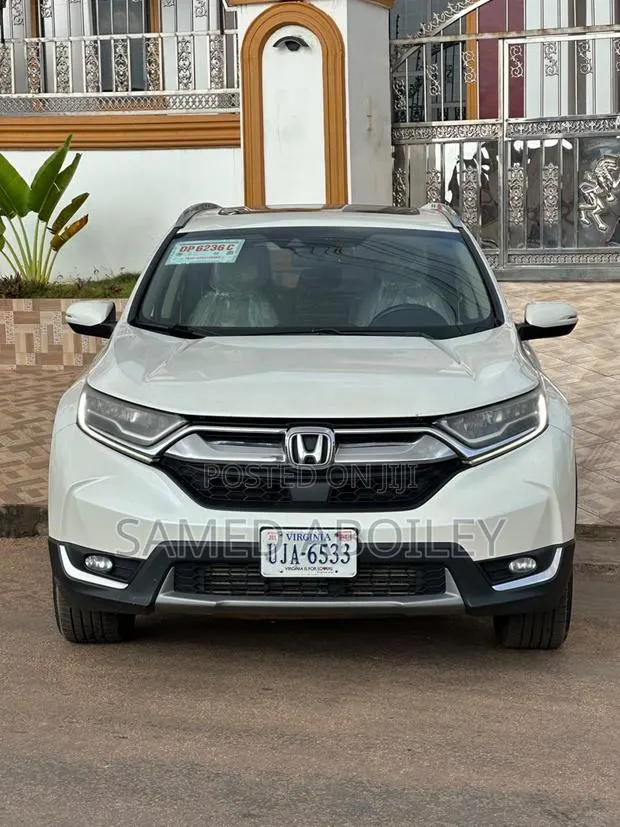 Honda CR-V Touring 4dr SUV (1.5L 4cyl CVT) 2017 White · Photo 1