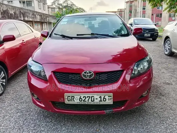 Toyota Corolla 2010 Red · Photo 1