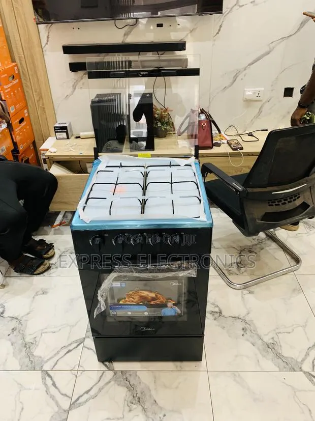 Best Buy for Less Midea 4burner Gas Cooker Oven · Photo 1