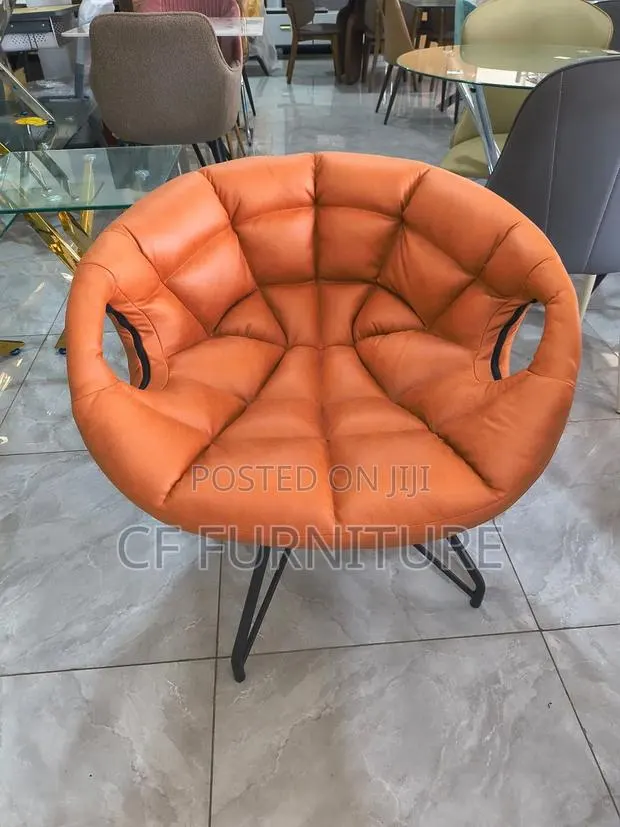 The Orbit Tufted Accent Chair · Photo 1
