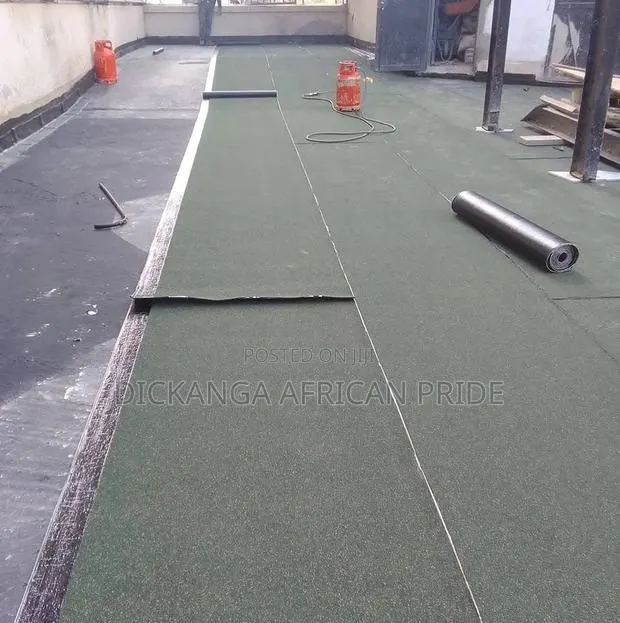 Bitumen Membrane Seals Hidden Gutters to Stop Ceiling Leaks. · Photo 1