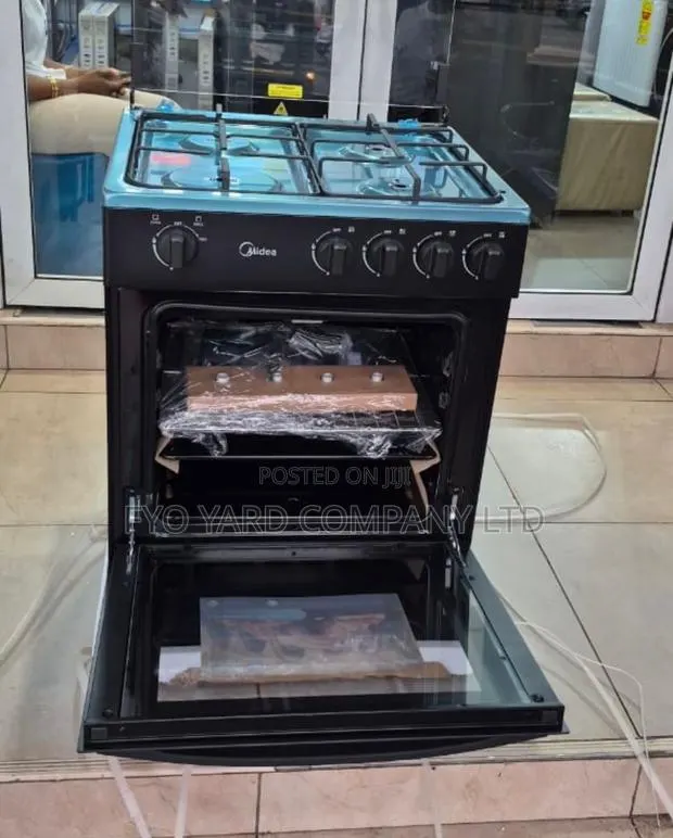 Midea 50x50 4 Burner Gascooker (Stainless Steel) · Photo 1