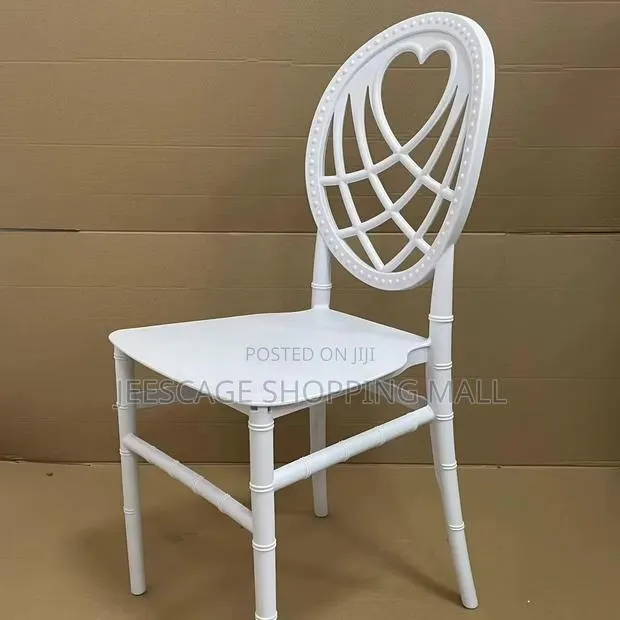 White Heart Back Resin Bamboo Style Event Chair · Photo 1