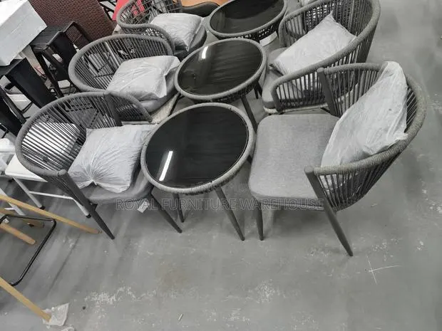 Rope-Woven Armchairs and a Round Bistro Table With Tempered Glass Top. · Photo 1