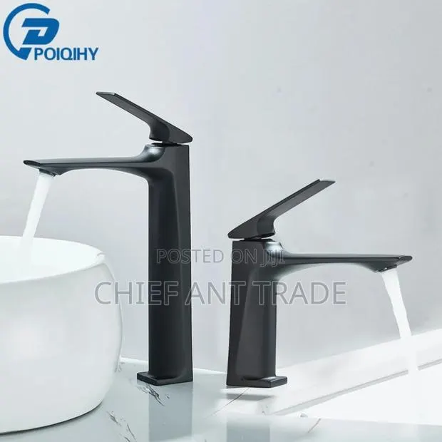 Solid Basin Faucet Tap · Photo 1