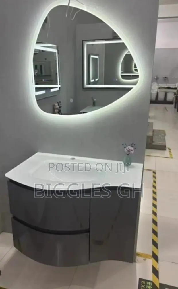 Vanity Cabinet Basin With Curved Led Mirror · Photo 1