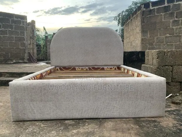 Cloud Soft Curved Upholstered Bed Frame · Photo 1