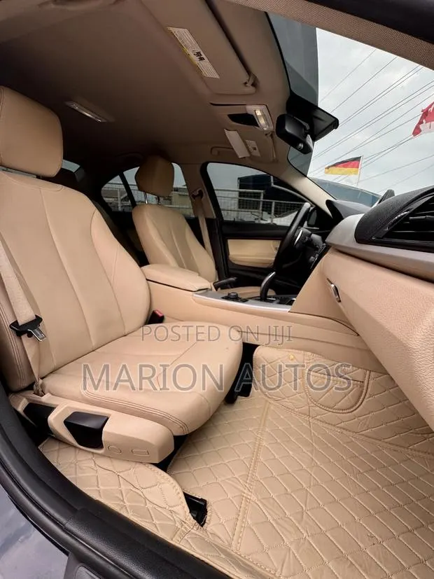 BMW 320i Sedan RWD 2018 Black · Photo 1