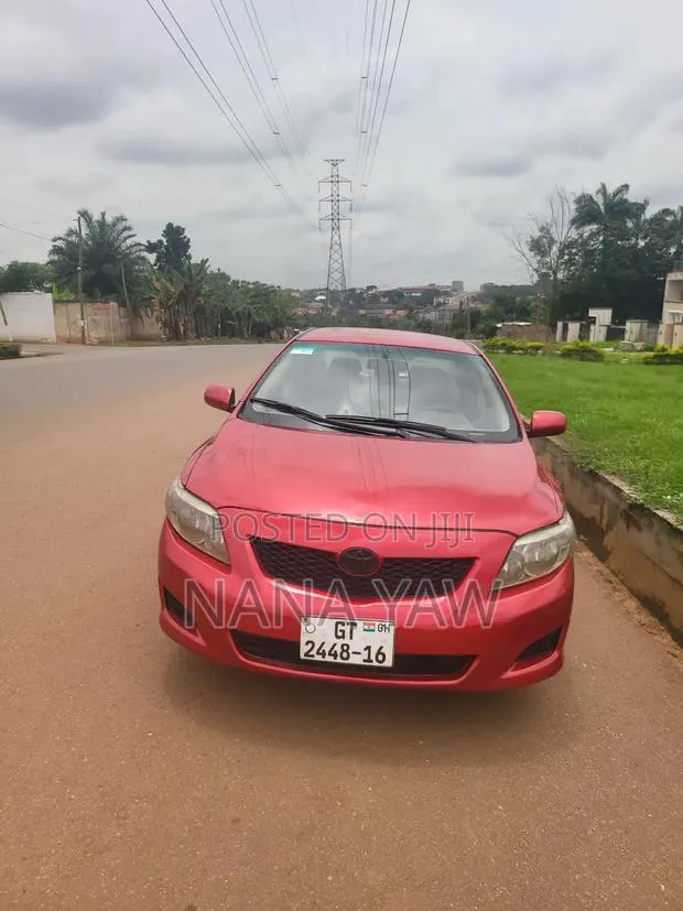 Toyota Corolla LE 4dr Sedan (1.8L 4cyl 4A) 2010 Red · Photo 1
