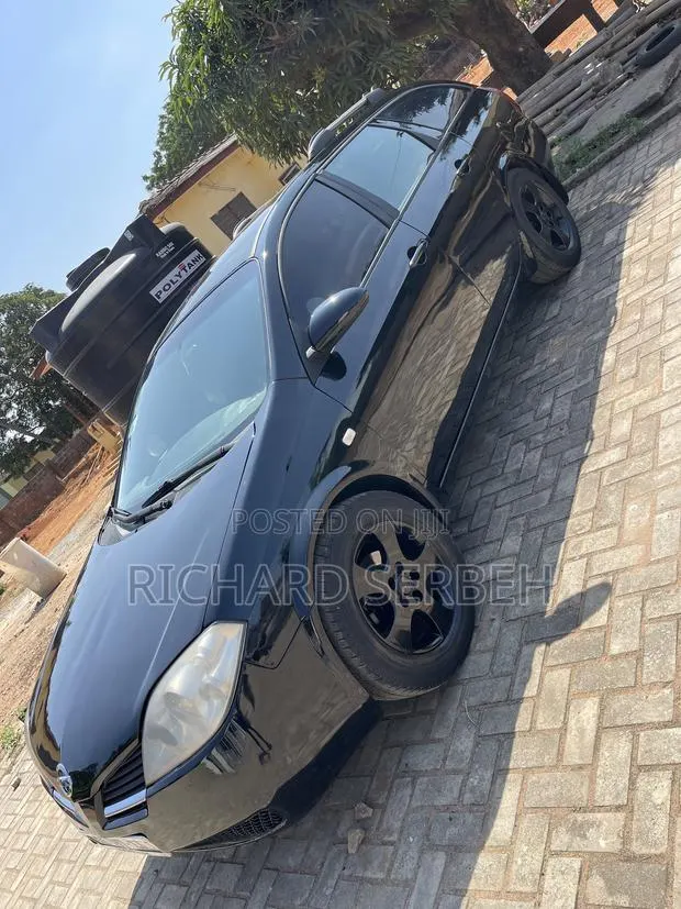 Nissan Primera 2010 Black · Photo 1