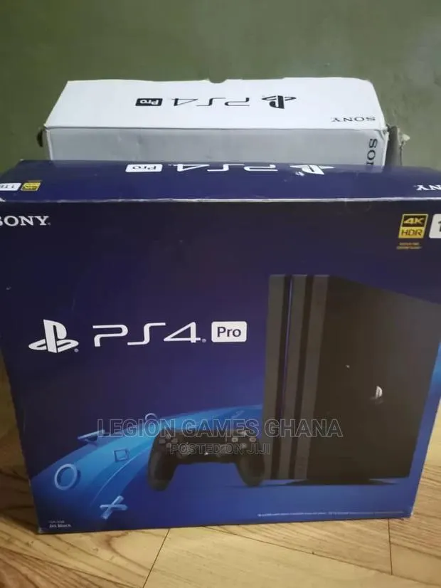 Playstation 4 Pro in Box With Games · Photo 1