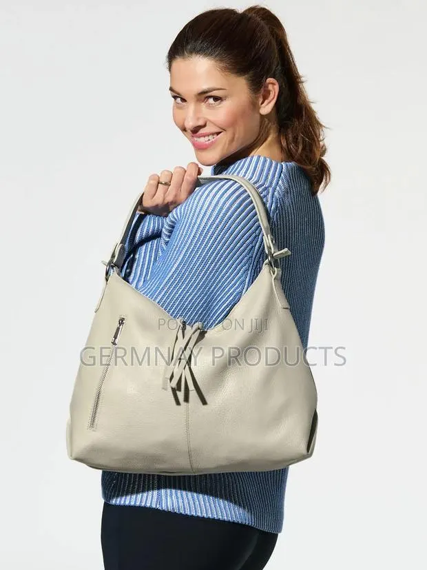 Leather Pouch Bag · Photo 1