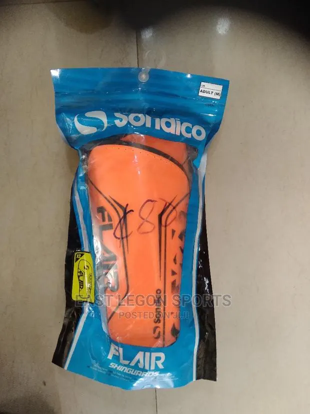 Orange Shinguard Football Protection · Photo 1