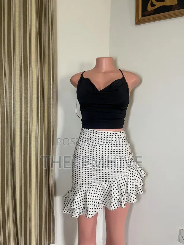 White Polka Dotted Skirt Thrift · Photo 1