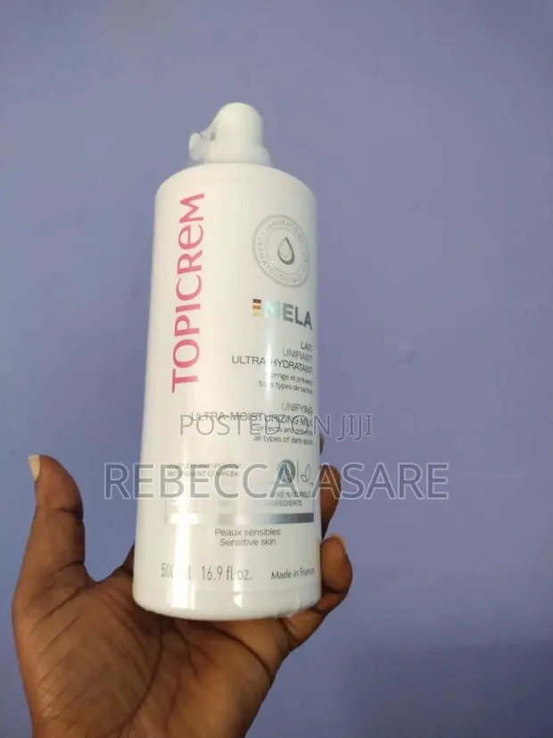 TOPICREM MELA Unifying Ultra-Moisturizing Milk (500ml) · Photo 1