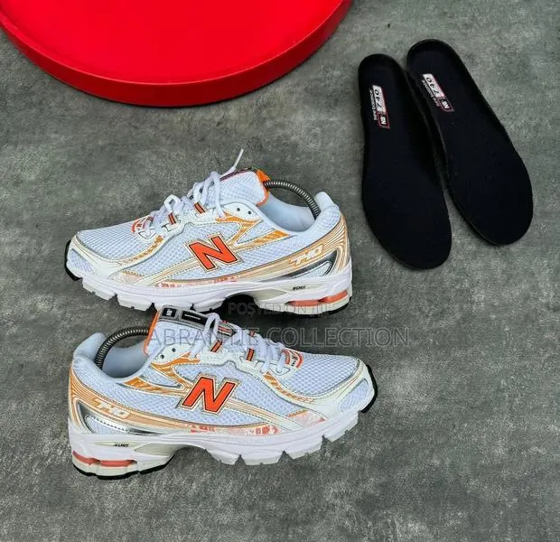 New Balance 740 White/Orange · Photo 1