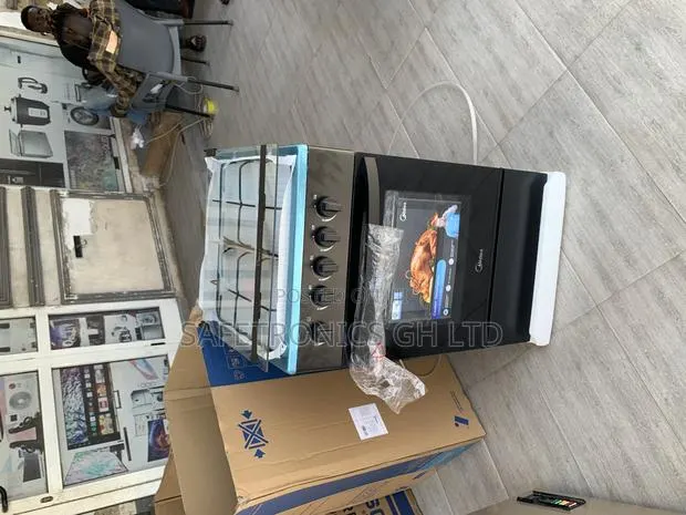 Newly Bulky Midea 4 Burner Gas Cooker 50x50 Grey · Photo 1