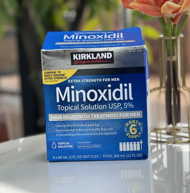 One Box ( 6 Bottles ) of Original Kirkland Minoxidil + Drop · Photo 1