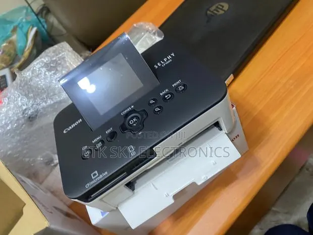 Showy Canon Selphy Compact Cp1000 Photo Printer · Photo 1