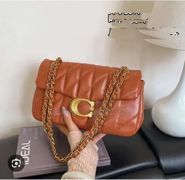 Coach Quilted Tabby Shouler Bag (Comes With a Box High Quality) · Photo 1