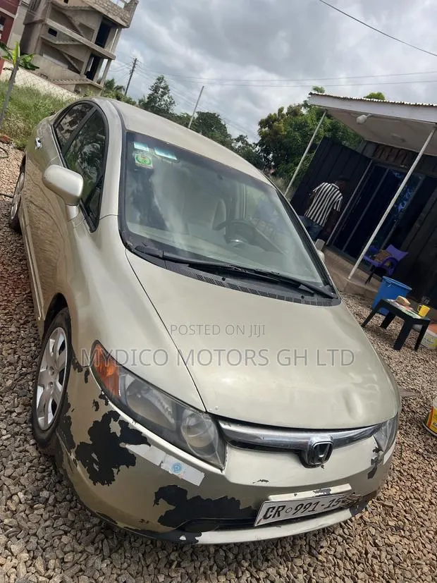 Honda Civic 2010 Gold · Photo 1