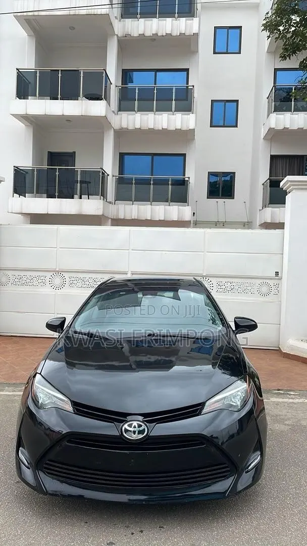 Toyota Corolla LE Eco (1.8L 4cyl 2A) 2018 Black · Photo 1