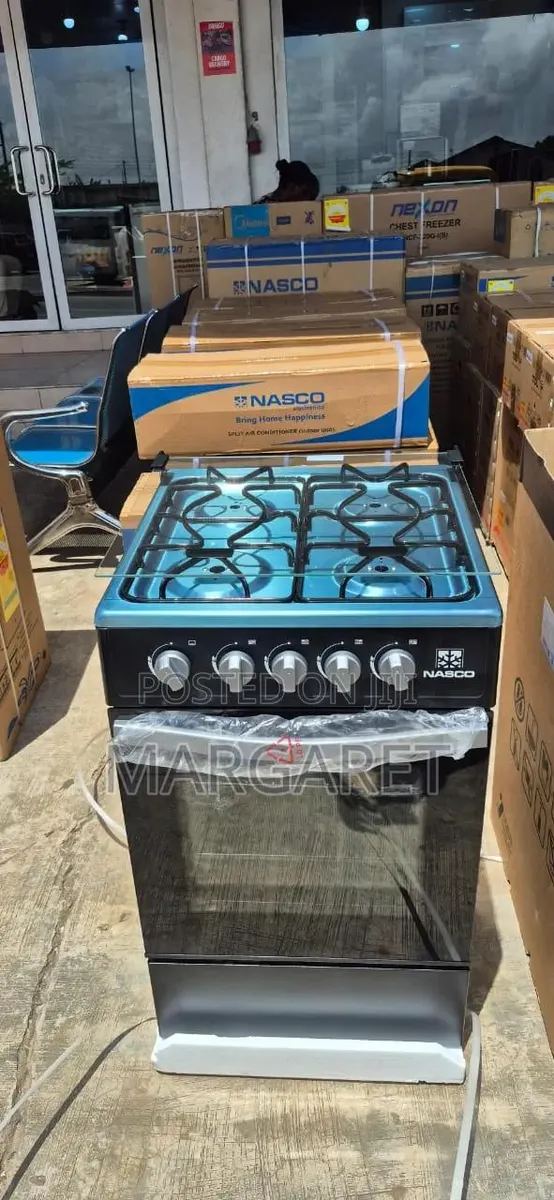 50 by 50 Nasco 4 Burners and Oven · Photo 1