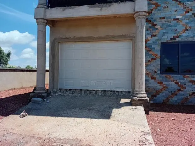Garage Doors With Smart Motor · Photo 1