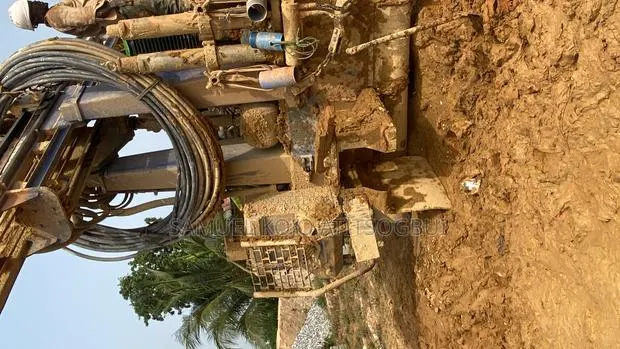 Drilling Borehole · Photo 1