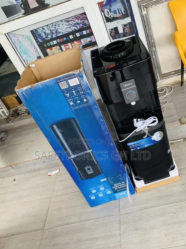 Massive Sealed Midea Water Dispenser 16 Liters 3 Tabs Cabinet Black · Photo 1