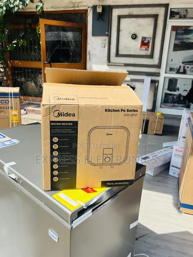 Ultra Modern Sleek Water Heater Midea 10l White ——- · Photo 1