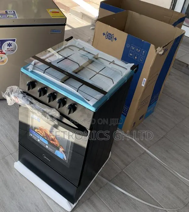 Ultra Modern Midea 4 Burner Gas Cooker Lack Mirror · Photo 1