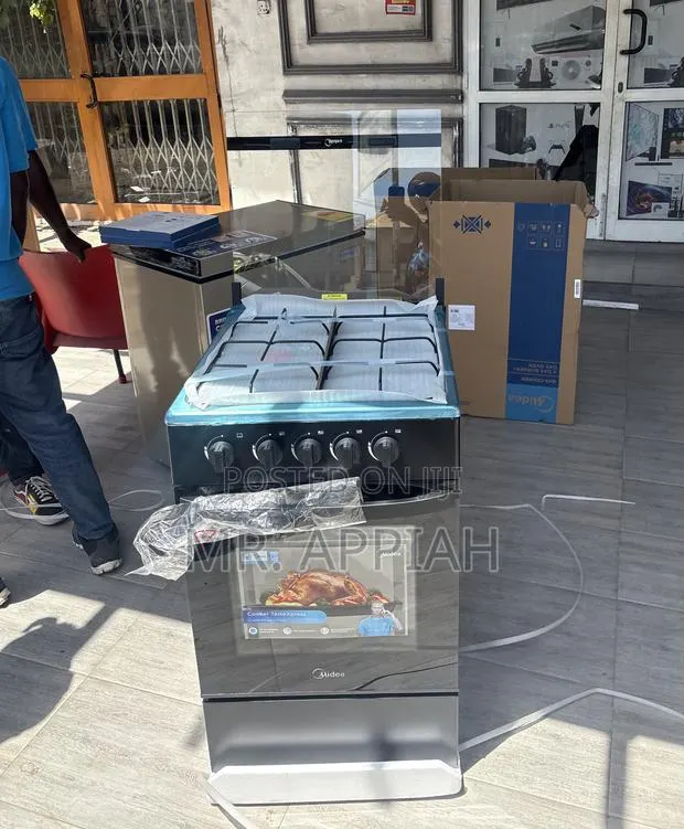 Check Out Durable Midea 4 Gas Burner With Grill(Black) Glass Lid · Photo 1