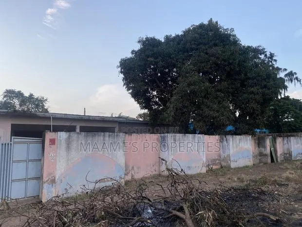 110x100 Land With Old Structure on Forsale at Adenta Housing · Photo 1