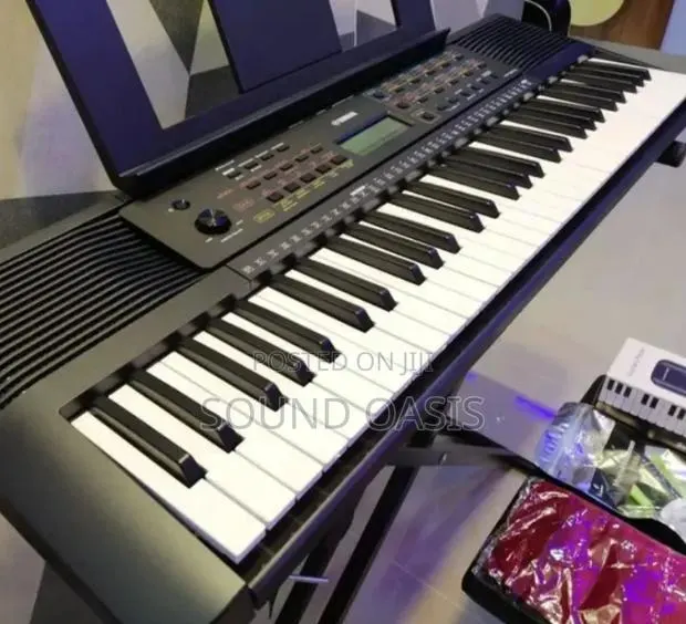 Yamaha, 61-Key PSR-E273 Portable Keyboard · Photo 1