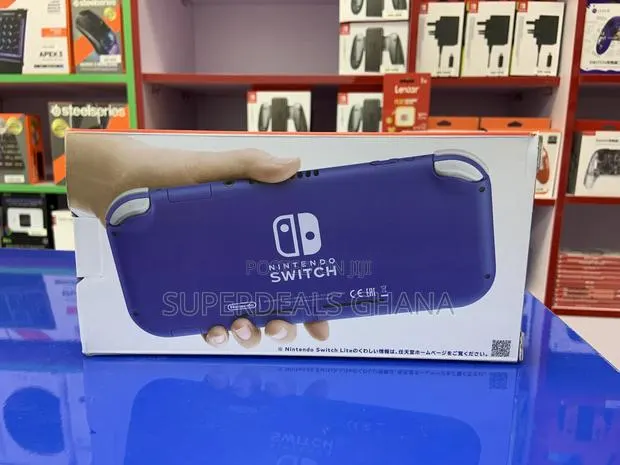 Nintendo Switch LITE Blue + 64gb SD Card · Photo 1