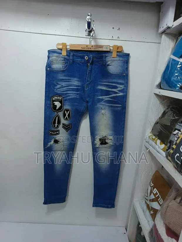Experience The Best Of Men's Faded Denim Blue Jeans · Photo 1