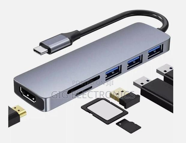 6 in 1 Multi-Port Usb C Hub Docking Station Supported · Photo 1