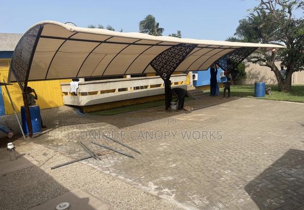 Y Carport Designed Carport · Photo 1